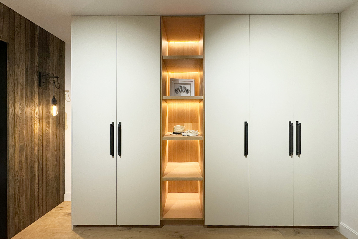 A white cabinet with lights